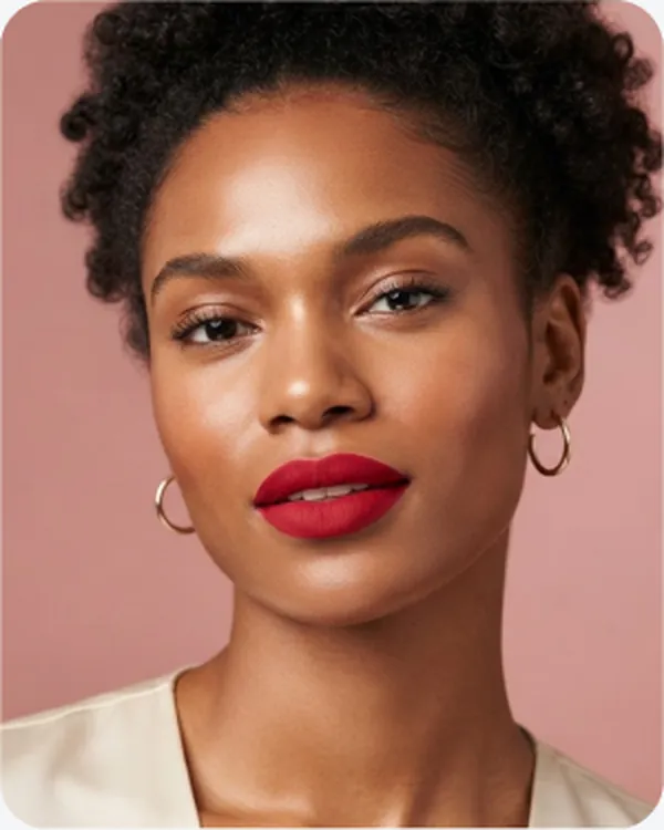 Portrait with bold red lips and gold hoops