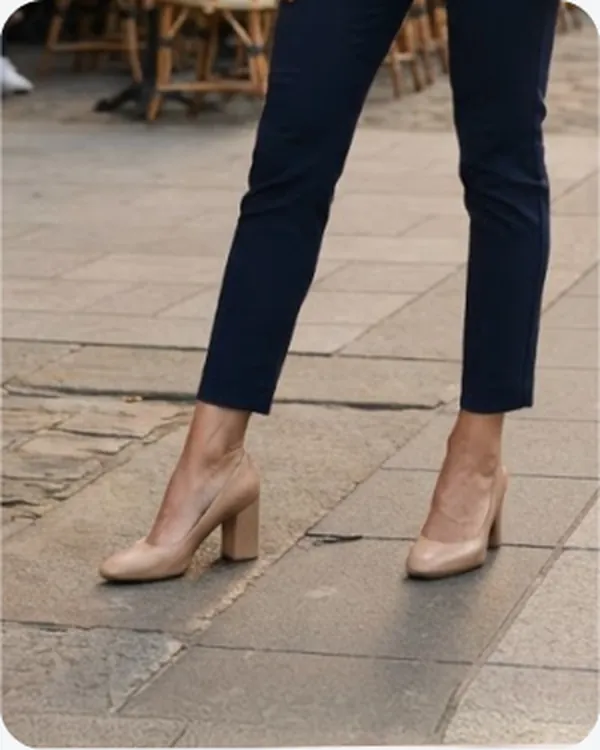Block heels worn with navy trousers